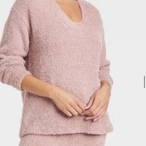 Stars above medium pink top